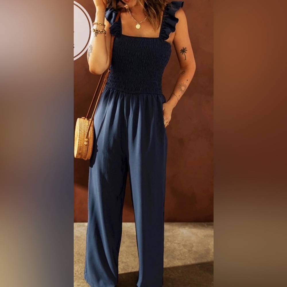 NWOT navy jumpsuit, size medium